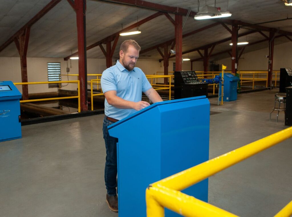 Nick Oberg operating the treatment plan controllers
